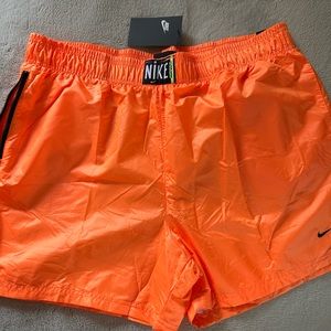 NEW!! Nike Women’s size XL ORANGE SHORTS. NEVER WORN NEW. New with tags.